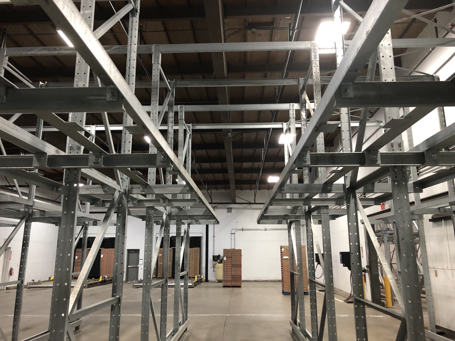 Upward view through drive-in rack beam and cross-brace structure