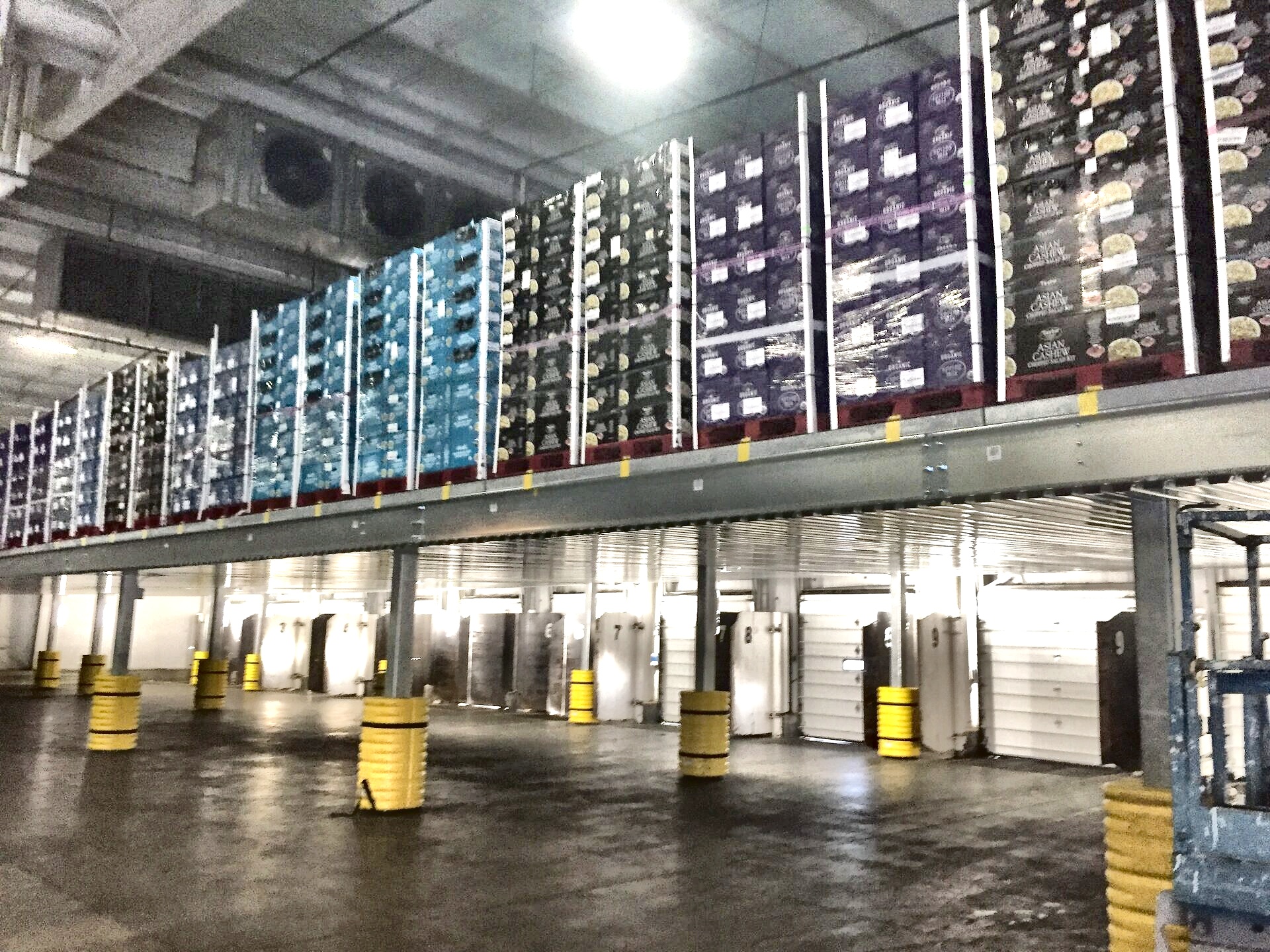 Overhead pallet storage above numbered dock doors