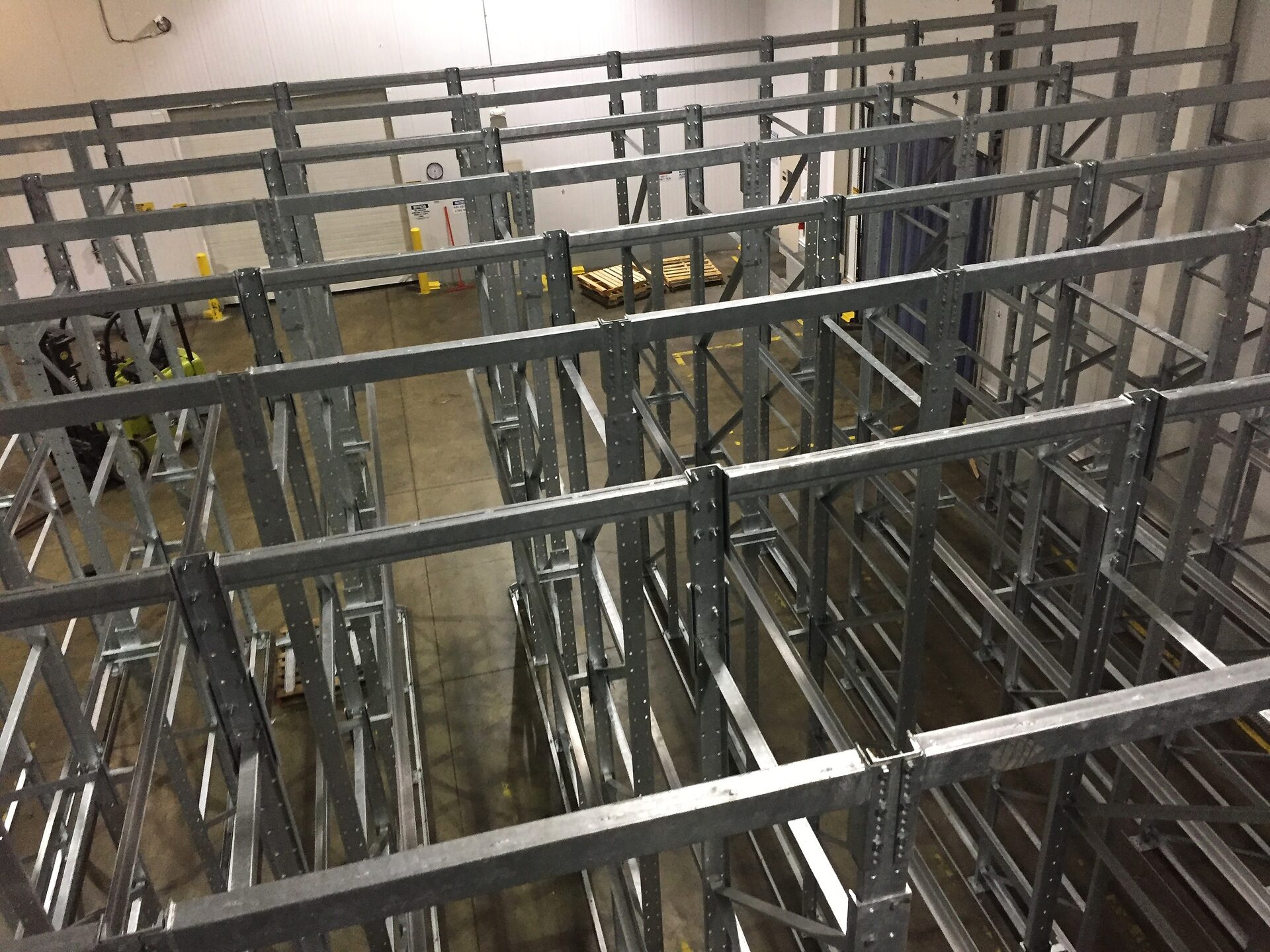 Elevated view looking down through rack support structure